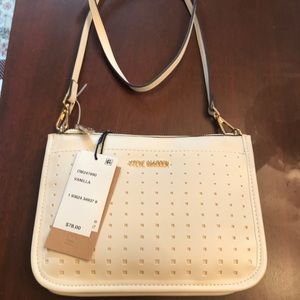 Sam Edelman Moana perforated cross body bag. Faux leather.